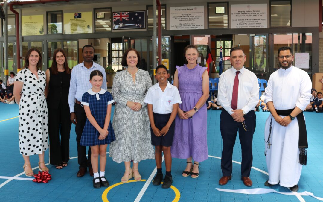 DAVIES OPENS REFURBISHED BASKETBALL COURT